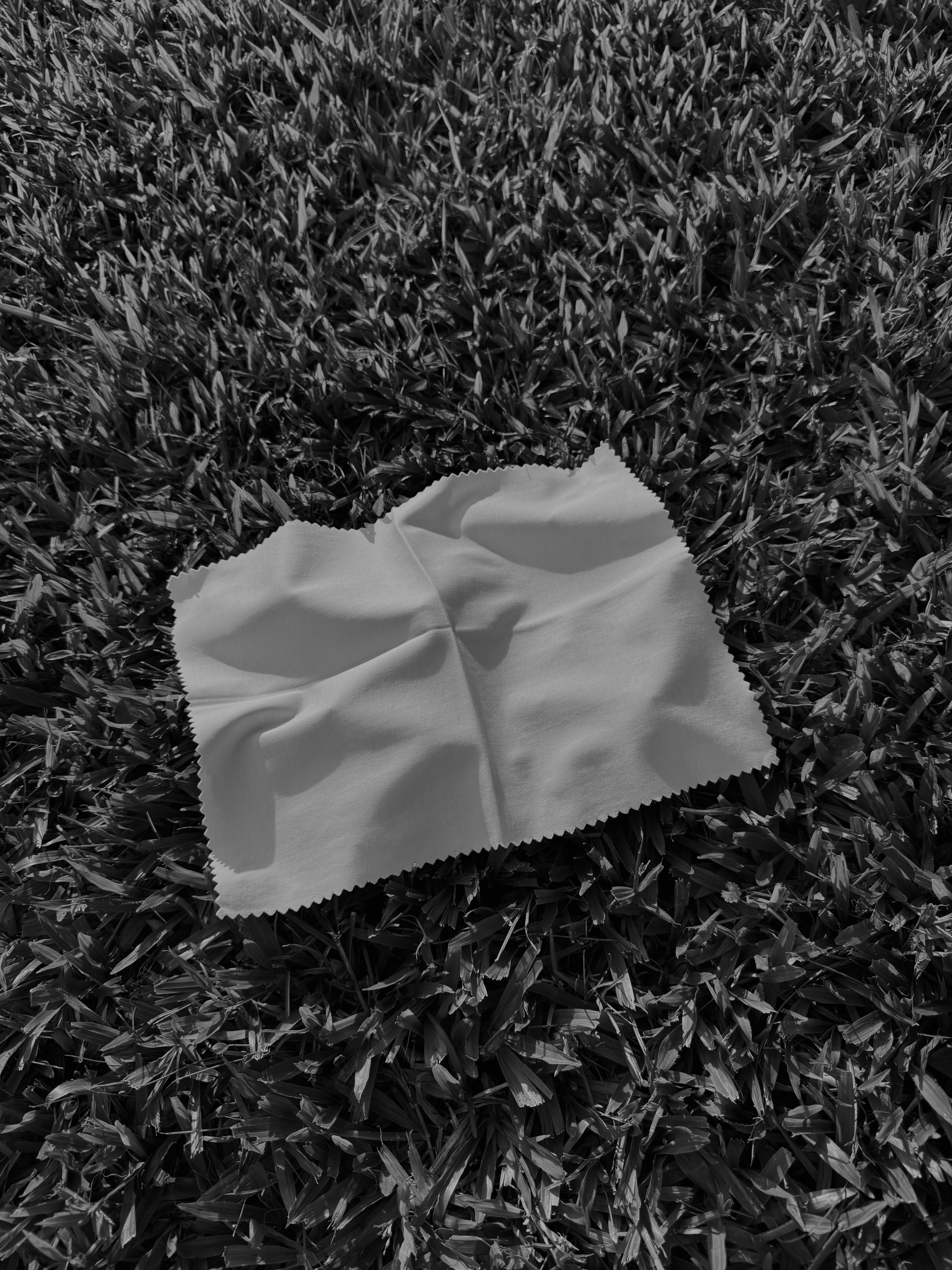 Close-up of AURETEMPHE organic cotton fabric, highlighting natural texture.