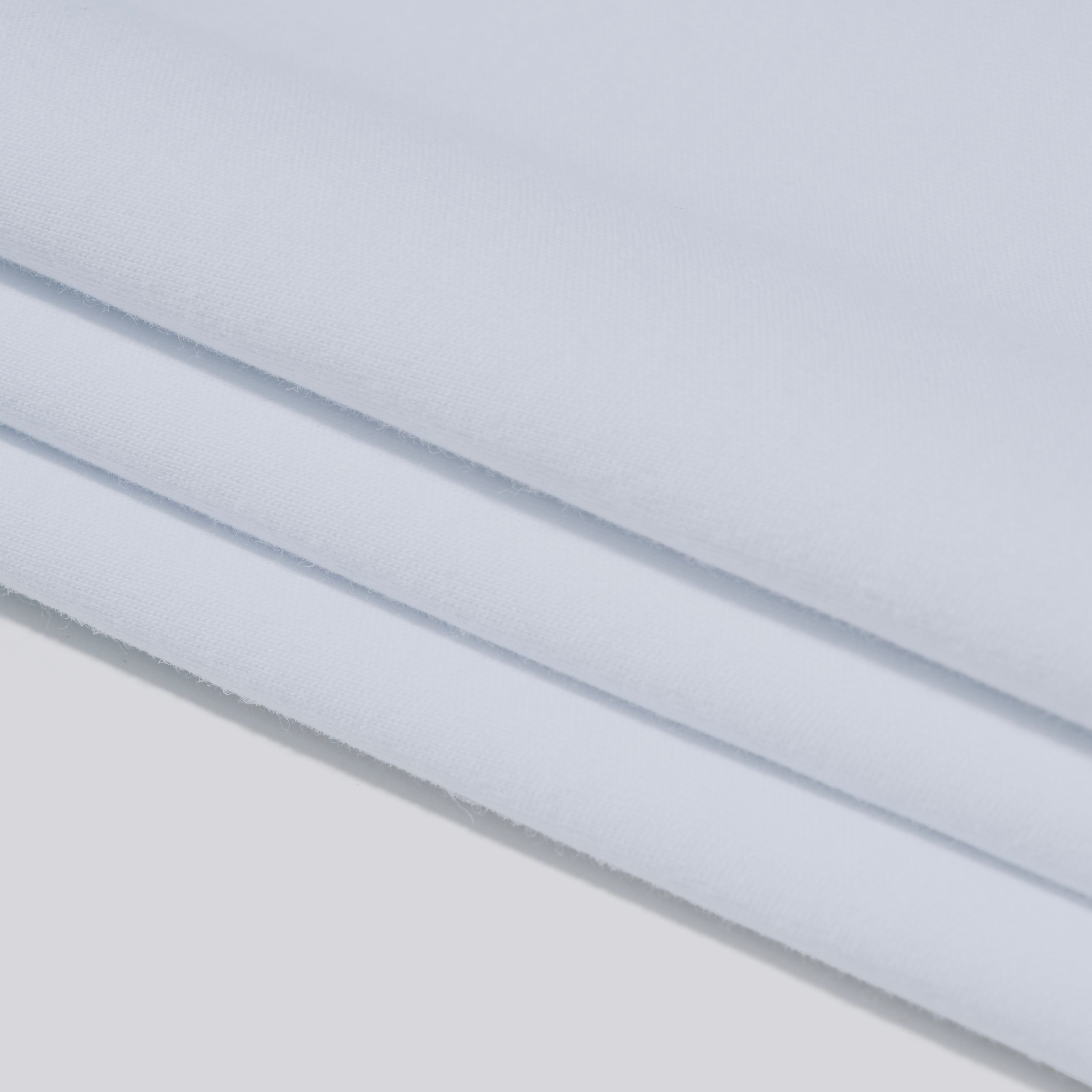 Detail view of Moonlight White organic cotton fabric by AURETEMPHE.